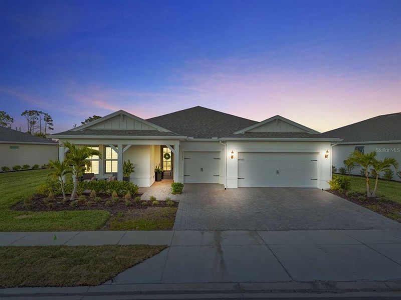 Front exterior of a new home in , Punta Gorda, FL, highlighting curb appeal (Image 21). Front exterior of a new home in , Punta Gorda, FL, highlighting curb appeal (Image 21).