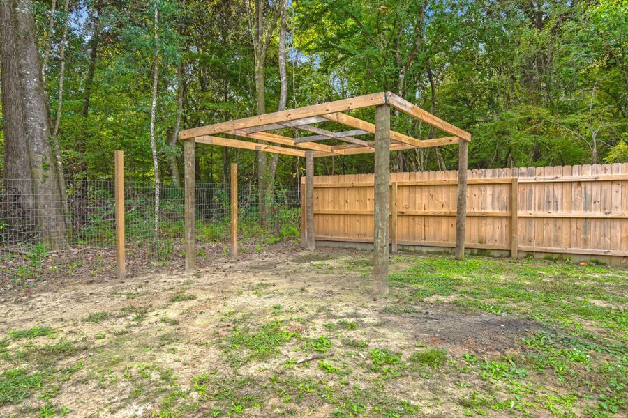 Exterior details and patio area of a home in , Ravenel (Image 2). Exterior details and patio area of a home in , Ravenel (Image 2).