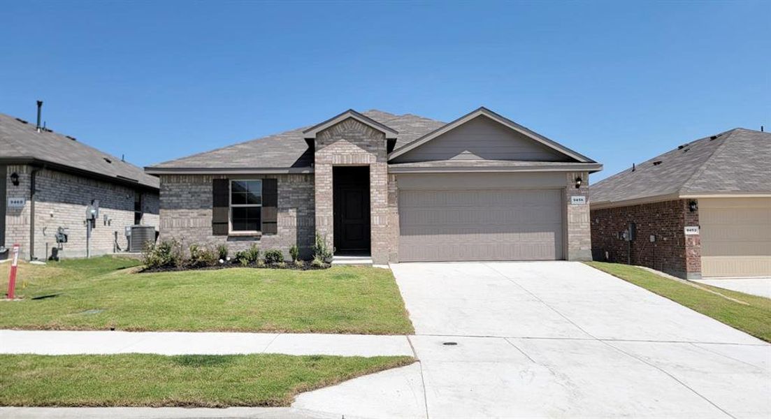 Front exterior of a new home in Highlands at Chapel Creek, Fort Worth, TX, highlighting curb appeal (Image 14). Front exterior of a new home in Highlands at Chapel Creek, Fort Worth, TX, highlighting curb appeal (Image 14).