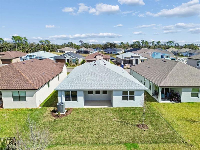 Exterior details and patio area of a home in Isles at Bayview, Parrish (Image 3).