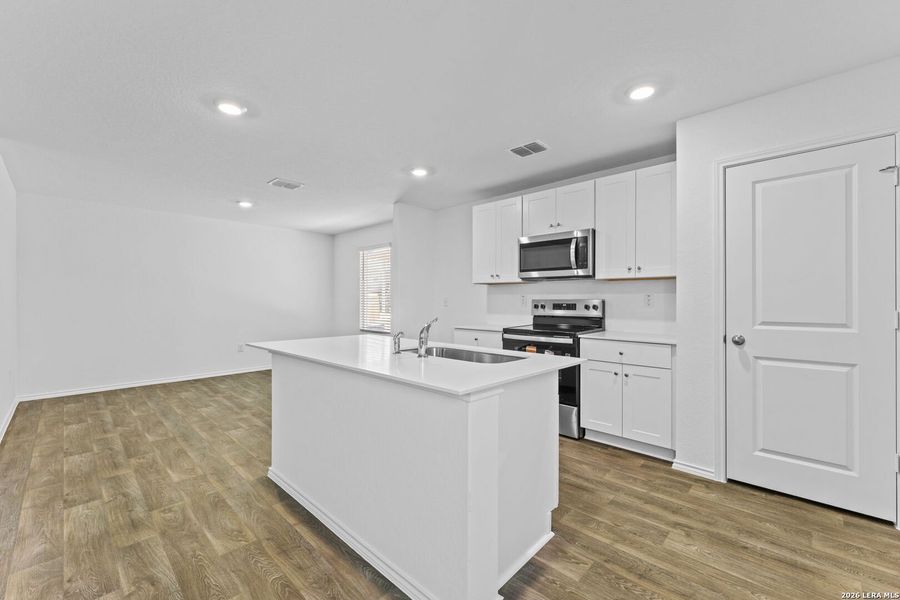 Furnished interior view inside a new home in Laurel Vistas, San Antonio (Image 4).