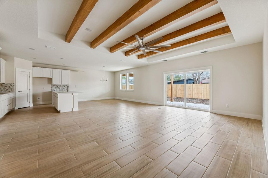 Great open floor plan with large kitchen island, pantry, dining, living - heart of the home.