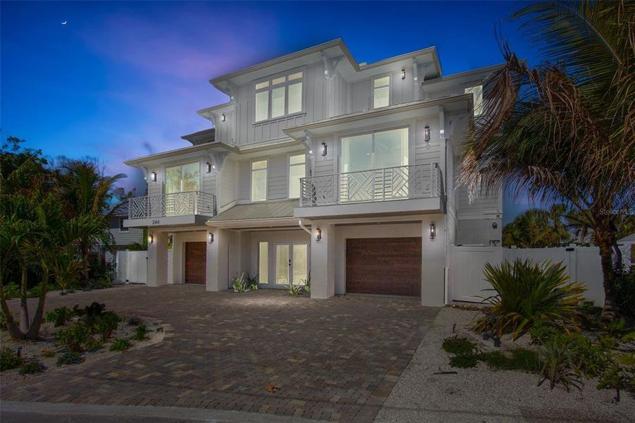 Front exterior of a new home in , Anna Maria, FL, highlighting curb appeal (Image 2).