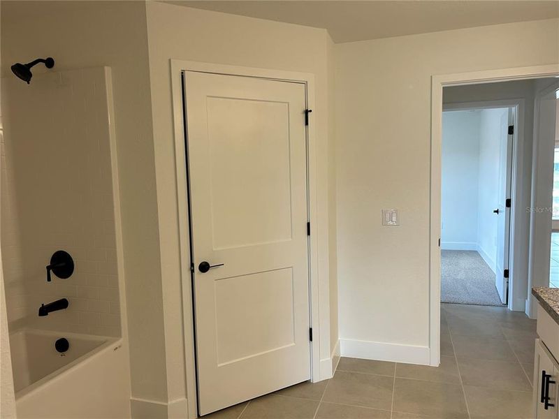 Spacious, unfurnished interior of a new home in Watercress Cove, North Port (Image 16).