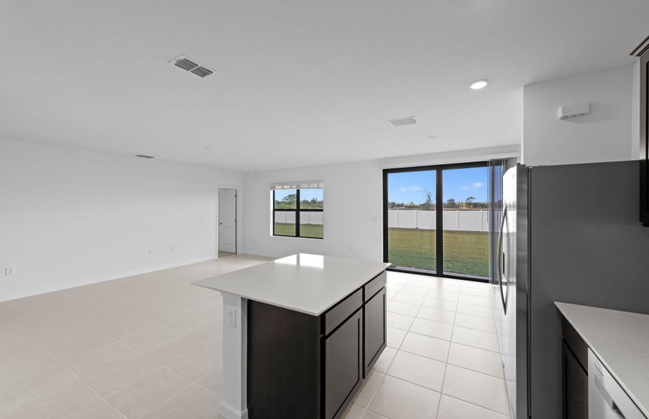 Furnished interior view inside a new home in Caloosa Cove, Labelle (Image 9).