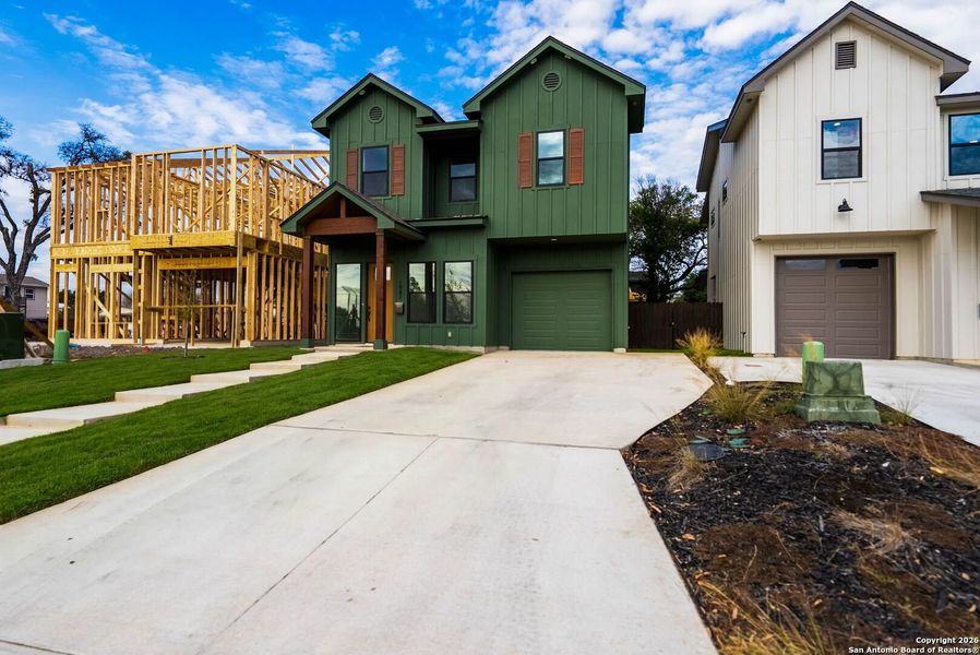 Front exterior of a new home in , San Antonio, TX, highlighting curb appeal (Image 26).