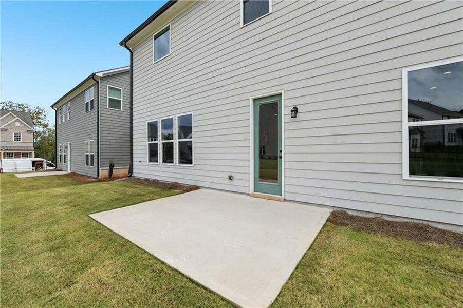 Exterior details and patio area of a home in East Harbor II at Chestatee, Dawsonville (Image 20).