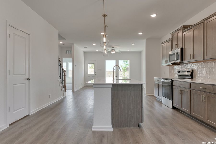 Furnished interior view inside a new home in Hennersby Hollow, San Antonio (Image 8).