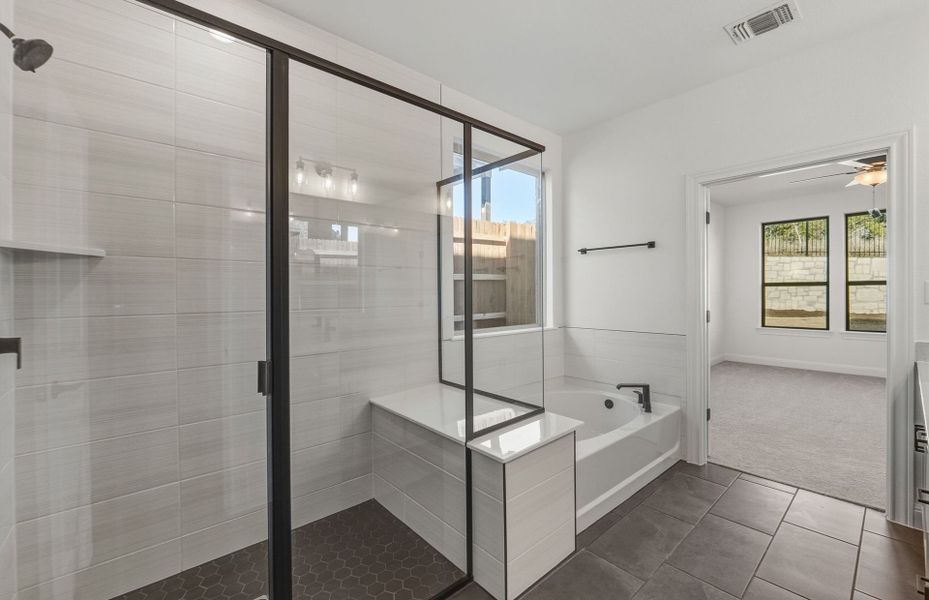 Furnished interior view inside a new home in West Cypress Hills, Spicewood (Image 14).