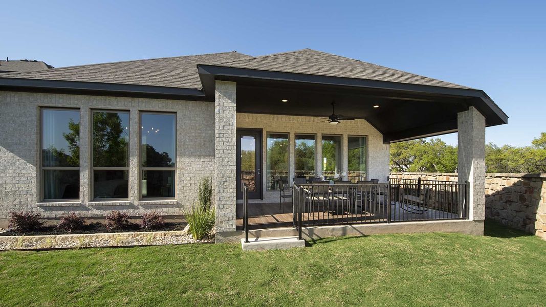 Exterior details and patio area of a home in Meadows of Mill Creek, Seguin (Image 28).