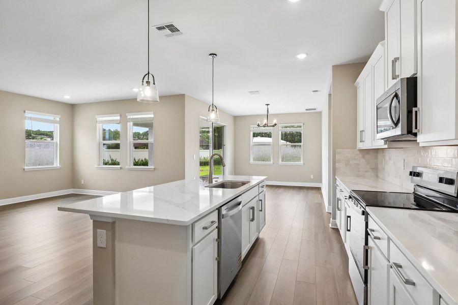 Furnished interior view inside a new home in Legends Preserve - Signature Series, Daytona Beach (Image 4).