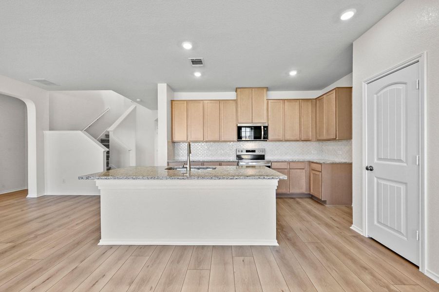 Furnished interior view inside a new home in Mustang Valley, Manor (Image 7). Furnished interior view inside a new home in Mustang Valley, Manor (Image 7).