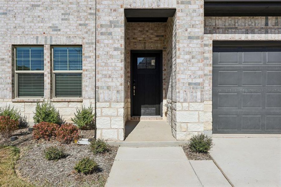 Exterior details and patio area of a home in Southridge - Signature Series, McKinney (Image 3). Exterior details and patio area of a home in Southridge - Signature Series, McKinney (Image 3).