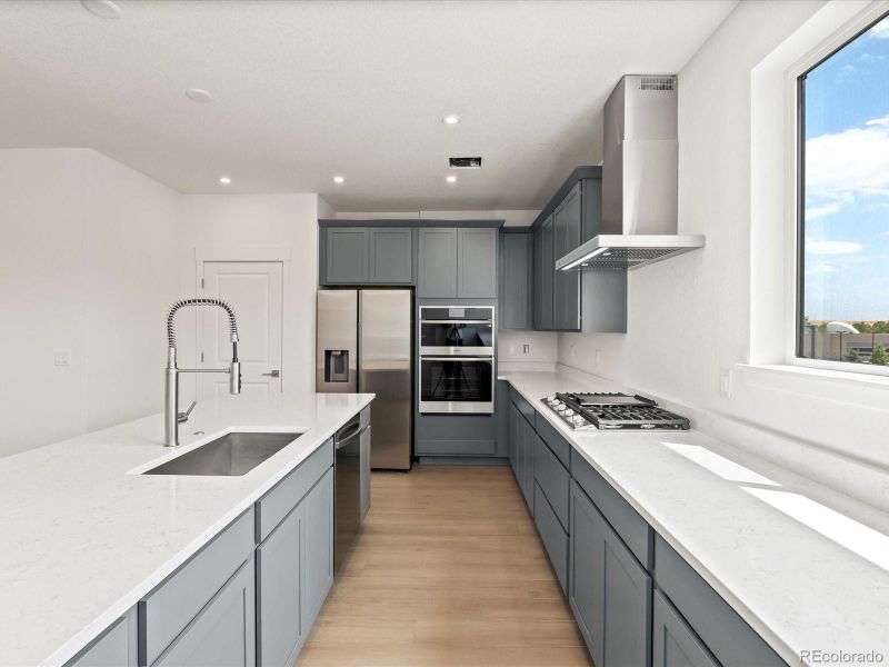 Furnished interior view inside a new home in Ascent at Inverness, Englewood (Image 5).