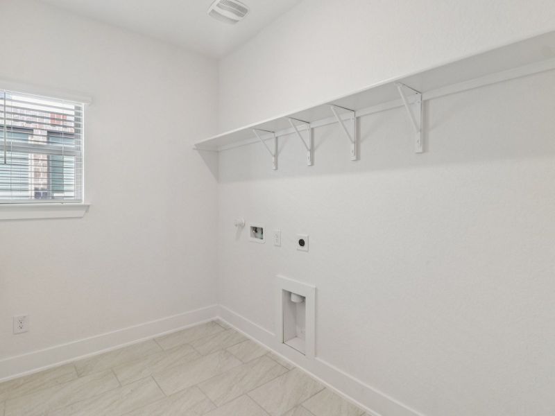 Laundry room in the Matador floorplan at a Meritage Homes community. Laundry room in the Matador floorplan at a Meritage Homes community.