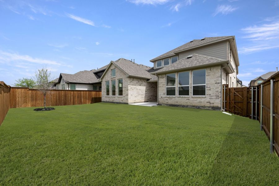 Exterior details and patio area of a home in Creekview Meadows, Pilot Point (Image 17). Exterior details and patio area of a home in Creekview Meadows, Pilot Point (Image 17).