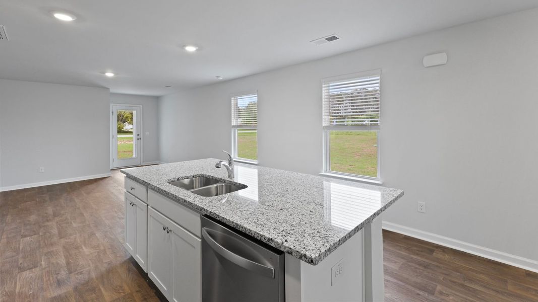 Representative furnished interior of a home built from the DOWNING by D.R. Horton in Saltgrass Landing, Winnabow (Image 8).