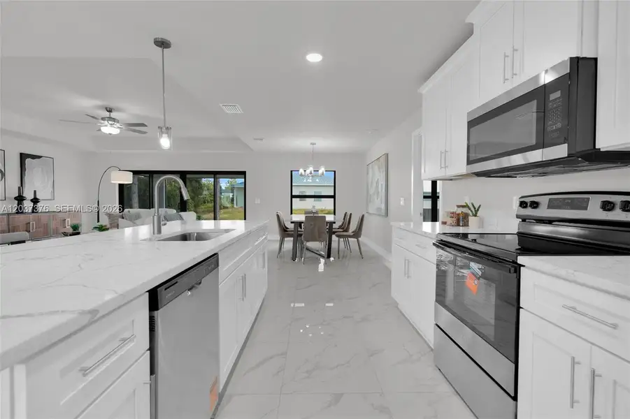 Furnished interior view inside a new home in , Lehigh Acres (Image 11).