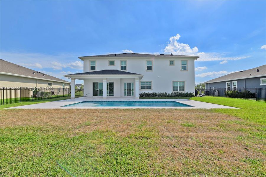 Exterior details and patio area of a home in Arden: The Waterford Collection, Loxahatchee (Image 36).