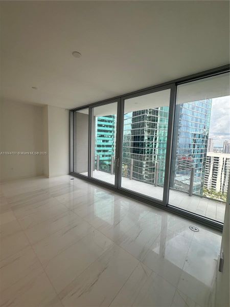 Spacious, unfurnished interior of a new home in Aston Martin Residences, Miami (Image 11).