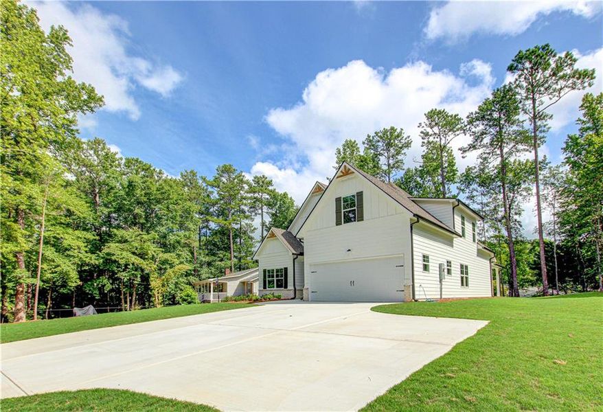 Front exterior of a new home in , Villa Rica, GA, highlighting curb appeal (Image 25).