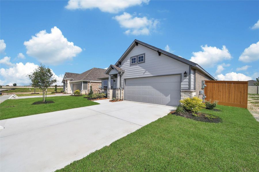 Front exterior of a new home in , Rosharon, TX, highlighting curb appeal (Image 18).