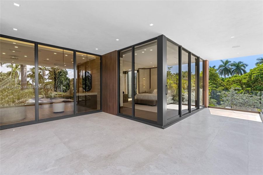 Exterior details and patio area of a home in , Miami Beach (Image 23). Exterior details and patio area of a home in , Miami Beach (Image 23).