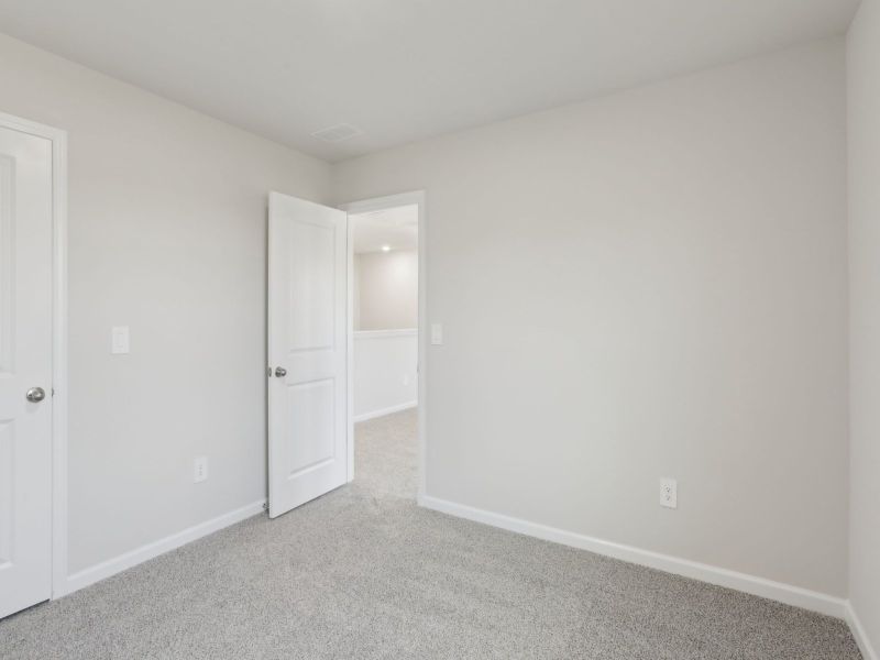 Secondary bedroom in the Dakota floorplan at 199 White Birch Lane.