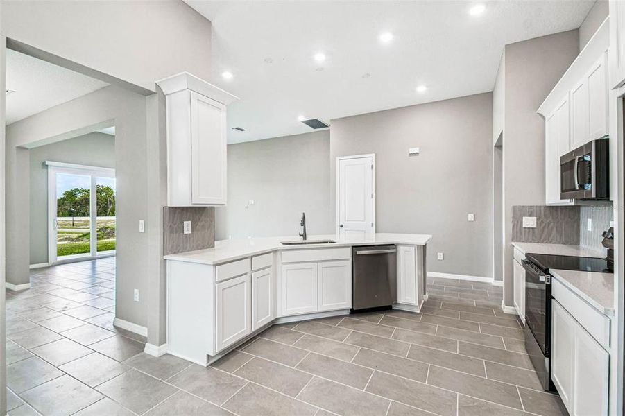 Furnished interior view inside a new home in Pinecone Reserve, Brooksville (Image 7). Furnished interior view inside a new home in Pinecone Reserve, Brooksville (Image 7).