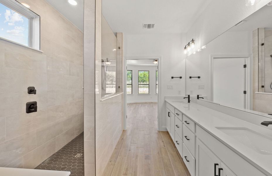 Furnished interior view inside a new home in West Cypress Hills, Spicewood (Image 7).