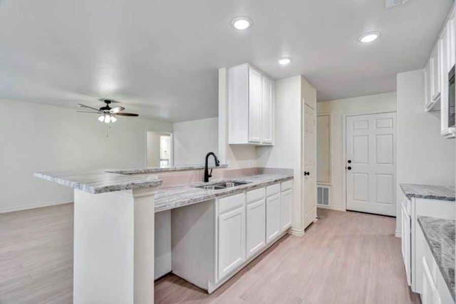 Furnished interior view inside a new home in , Fort Worth (Image 9).