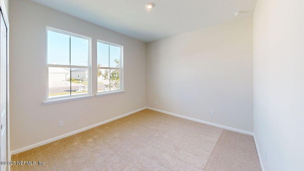 Spacious, unfurnished interior of a new home in Lakes at Bella Lago, Green Cove Springs (Image 14).