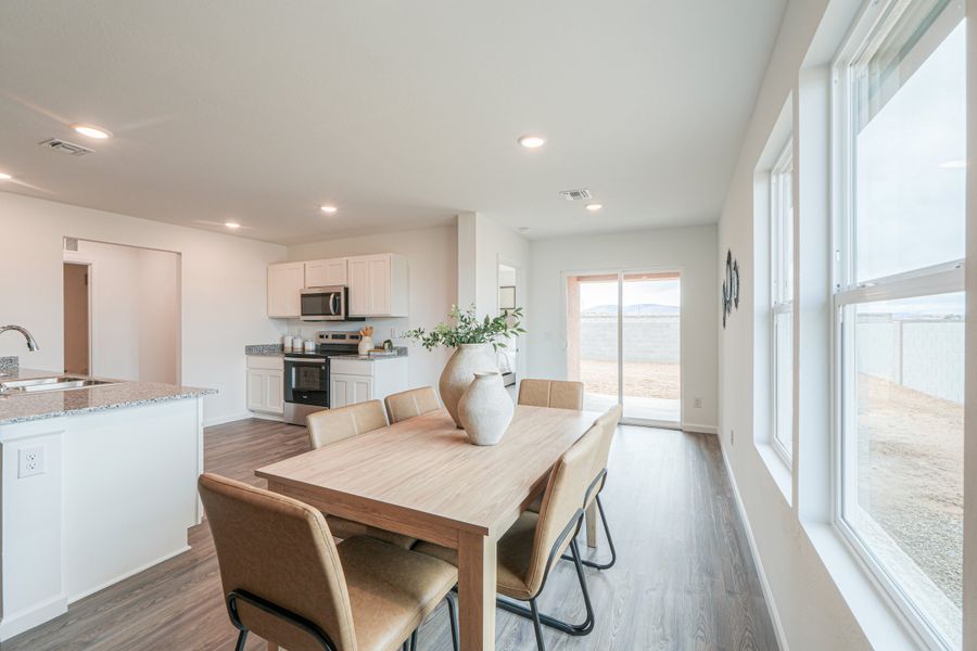 A kitchen and dining room area.