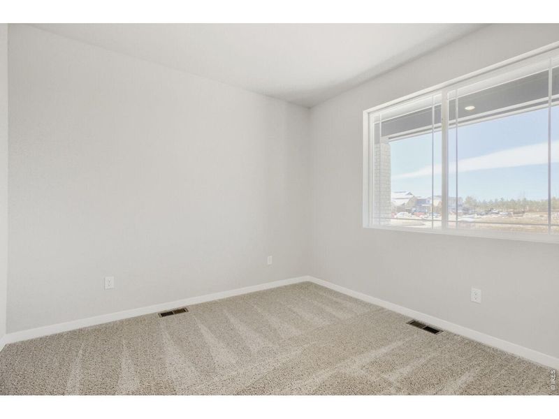 Spacious, unfurnished interior of a new home in Farmstead, Berthoud (Image 23).