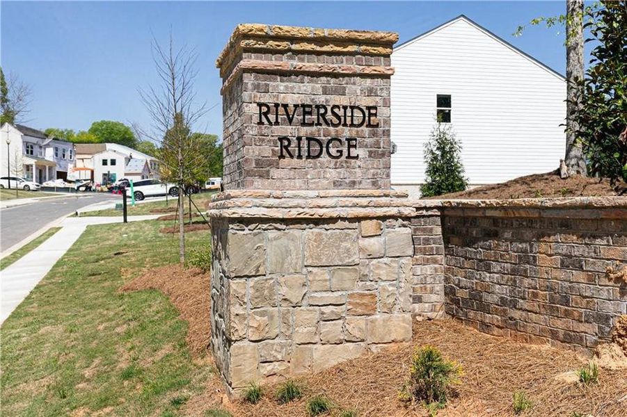 Front exterior of a new home in Riverside Ridge, Lawrenceville, GA, highlighting curb appeal (Image 1).