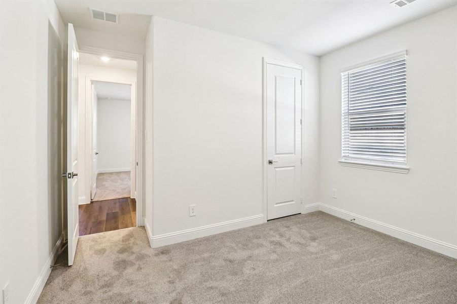 Spacious, unfurnished interior of a new home in Ashford Park - Texana Series, Corinth (Image 24). Spacious, unfurnished interior of a new home in Ashford Park - Texana Series, Corinth (Image 24).