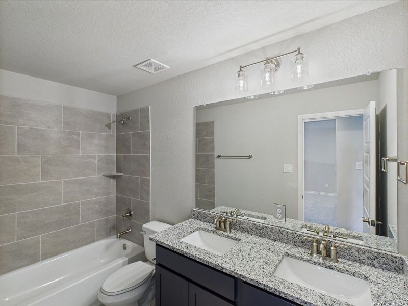 Furnished interior view inside a new home in Ladera, San Antonio (Image 17).