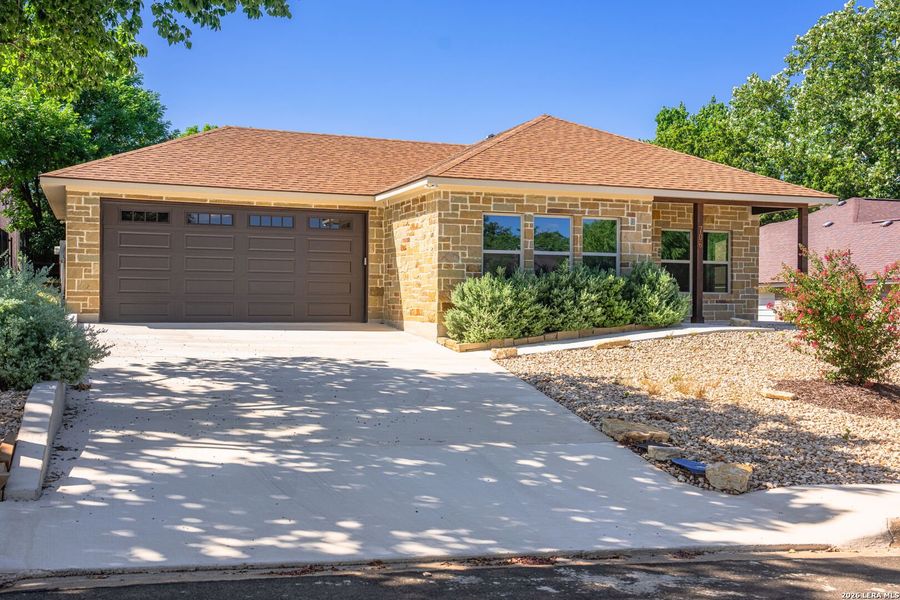 Front exterior of a new home in , Kerrville, TX, highlighting curb appeal (Image 25).