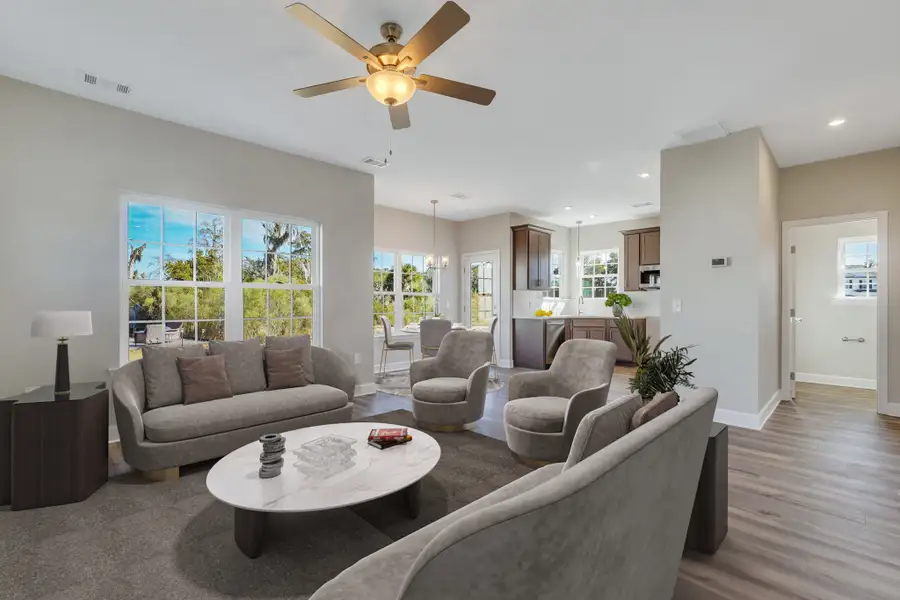 Rose Atoll - Virtually staged Family Room and Breakfast Nook | Ernest Homes