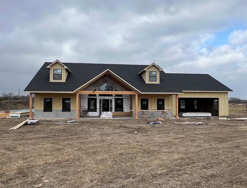 Still in construction phase. Home is currently planned to have white exterior with black accents and cedar trim. New pics will be added as completion happens.