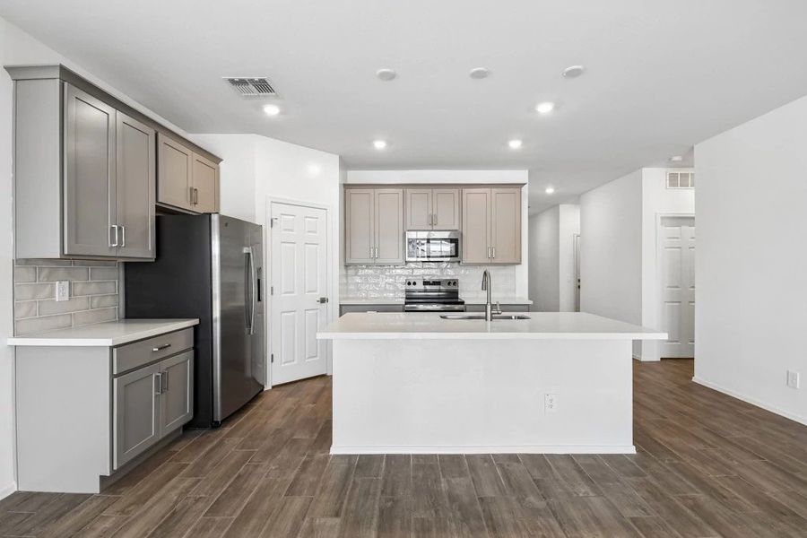 Kitchen featuring the Milan Collection. Not actual home, finishes and options may vary. Kitchen featuring the Milan Collection. Not actual home, finishes and options may vary.