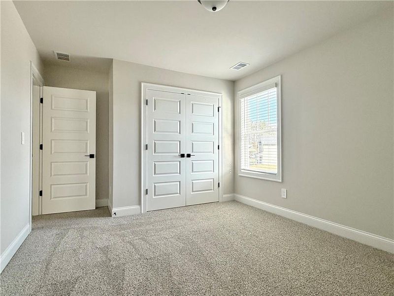Spacious, unfurnished interior of a new home in Vines at Mill Creek - Legacy Series, Braselton (Image 29).