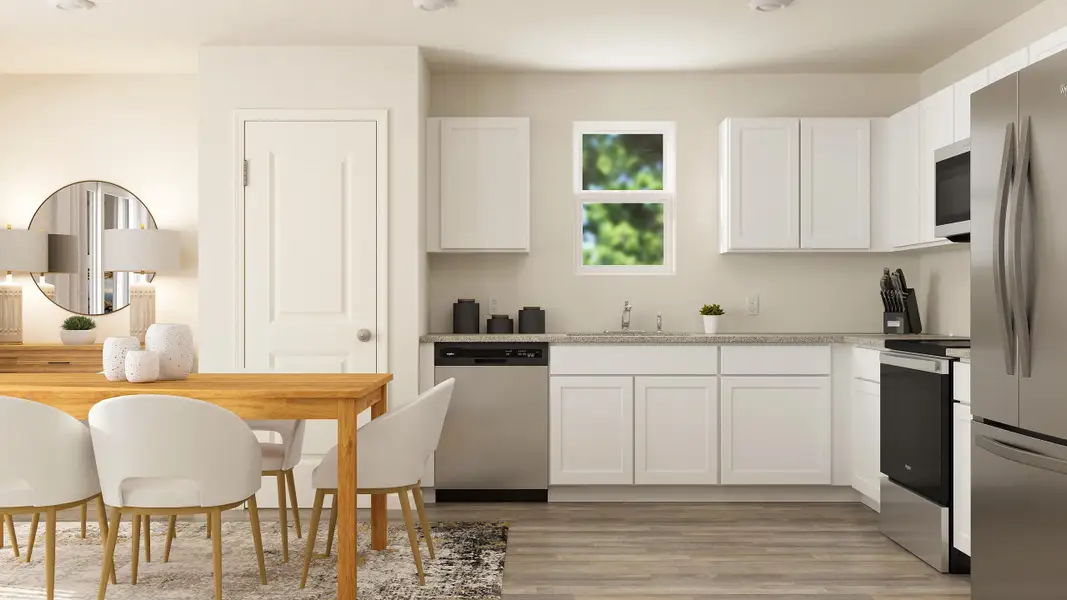 A kitchen with white cabinets. A kitchen with white cabinets.