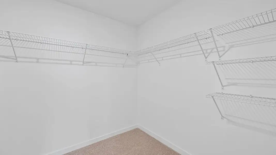 Spacious, unfurnished interior of a new home in Lone Oaks Farm, Cleveland (Image 20).