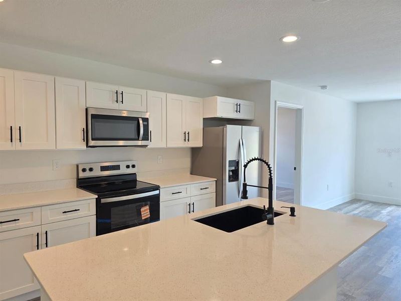 Furnished interior view inside a new home in , Port Charlotte (Image 12).