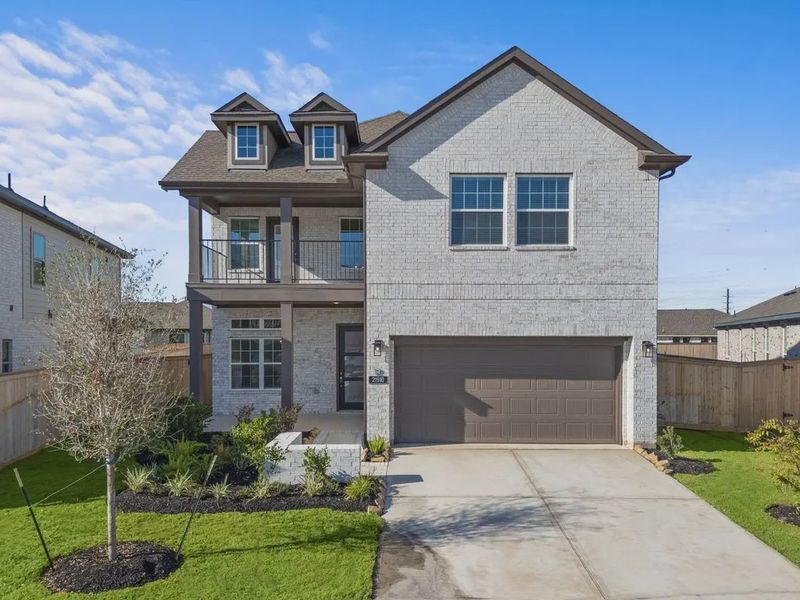 Representative exterior photo of a completed home built from the Emma by Chesmar Homes in Bridgeland, Elgin, TX (Image 20).