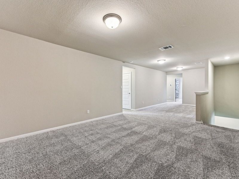 Spacious, unfurnished interior of a new home in Big Sky Ranch - Executive Collection, Dripping Springs (Image 17).