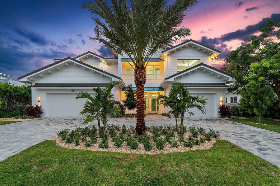 Front exterior of a new home in , Tequesta, FL, highlighting curb appeal (Image 1). Front exterior of a new home in , Tequesta, FL, highlighting curb appeal (Image 1).