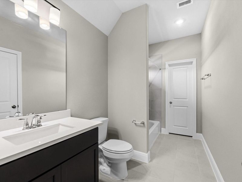 Furnished interior view inside a new home in Coastal Point, League City (Image 13).