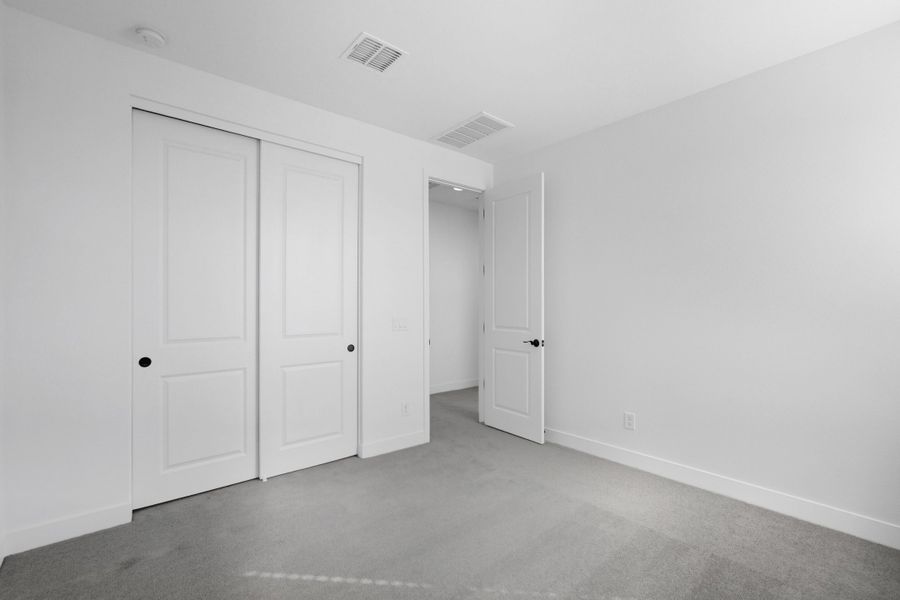 Spacious, unfurnished interior of a new home in Artisan at Asante, Surprise (Image 31).